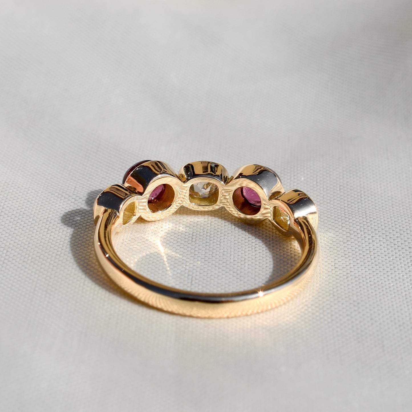 1.02 ct old mine cut diamond and tourmaline five stone ring