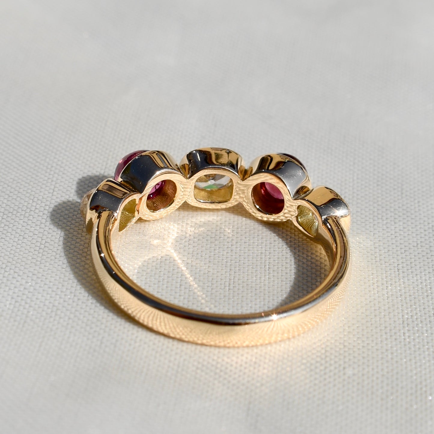 0.96 ct old mine cut diamond and tourmaline five stone ring