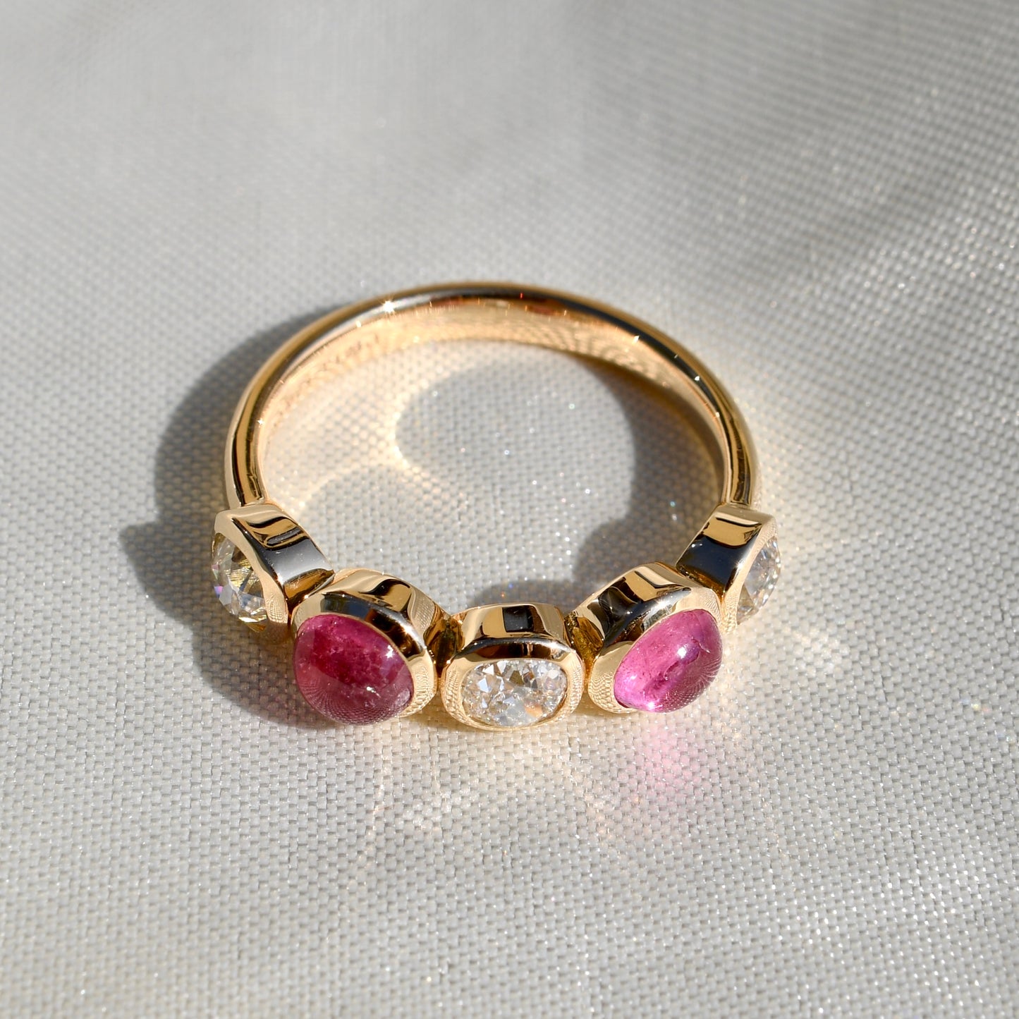 0.96 ct old mine cut diamond and tourmaline five stone ring