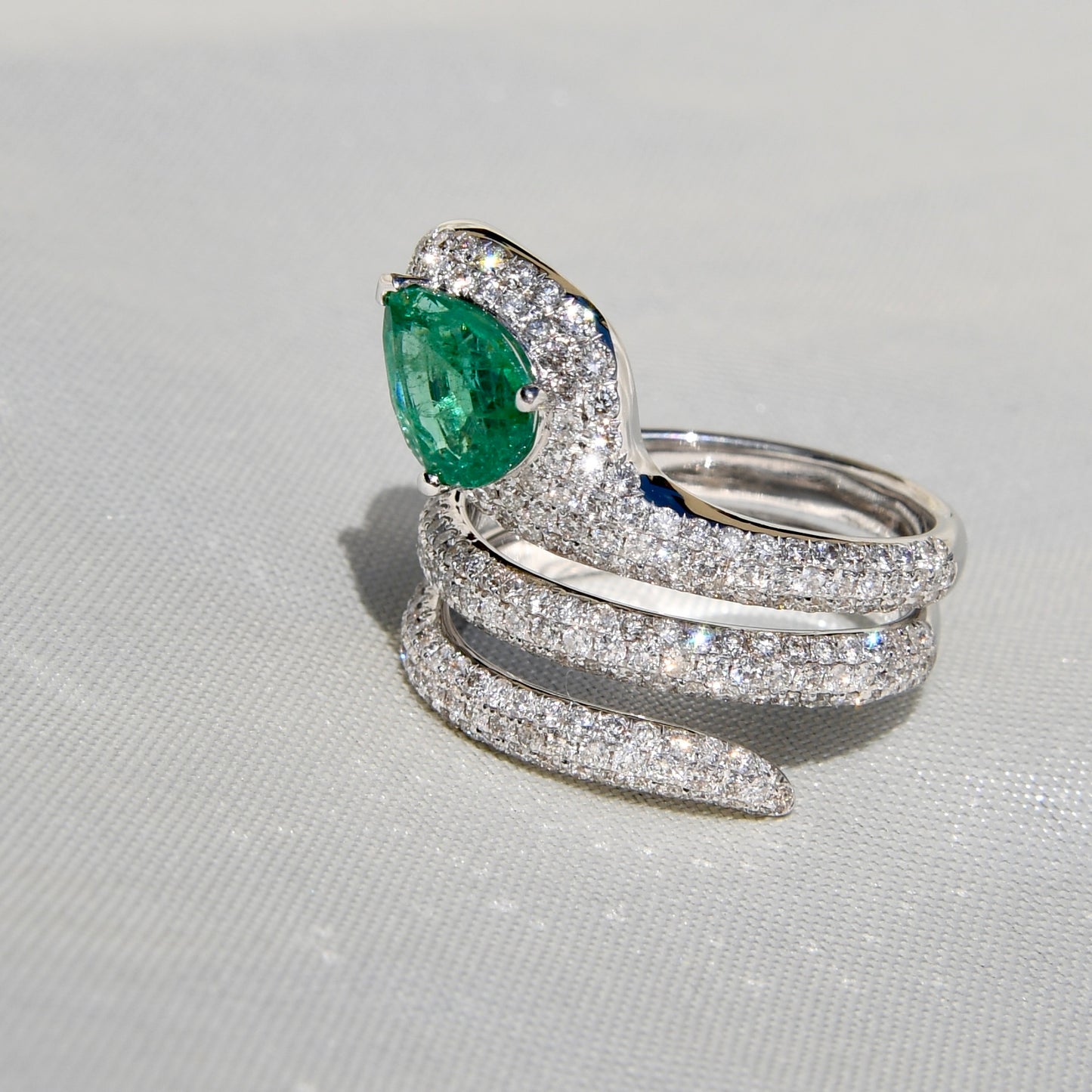 1.13 ct pear cut emerald and diamond snake ring