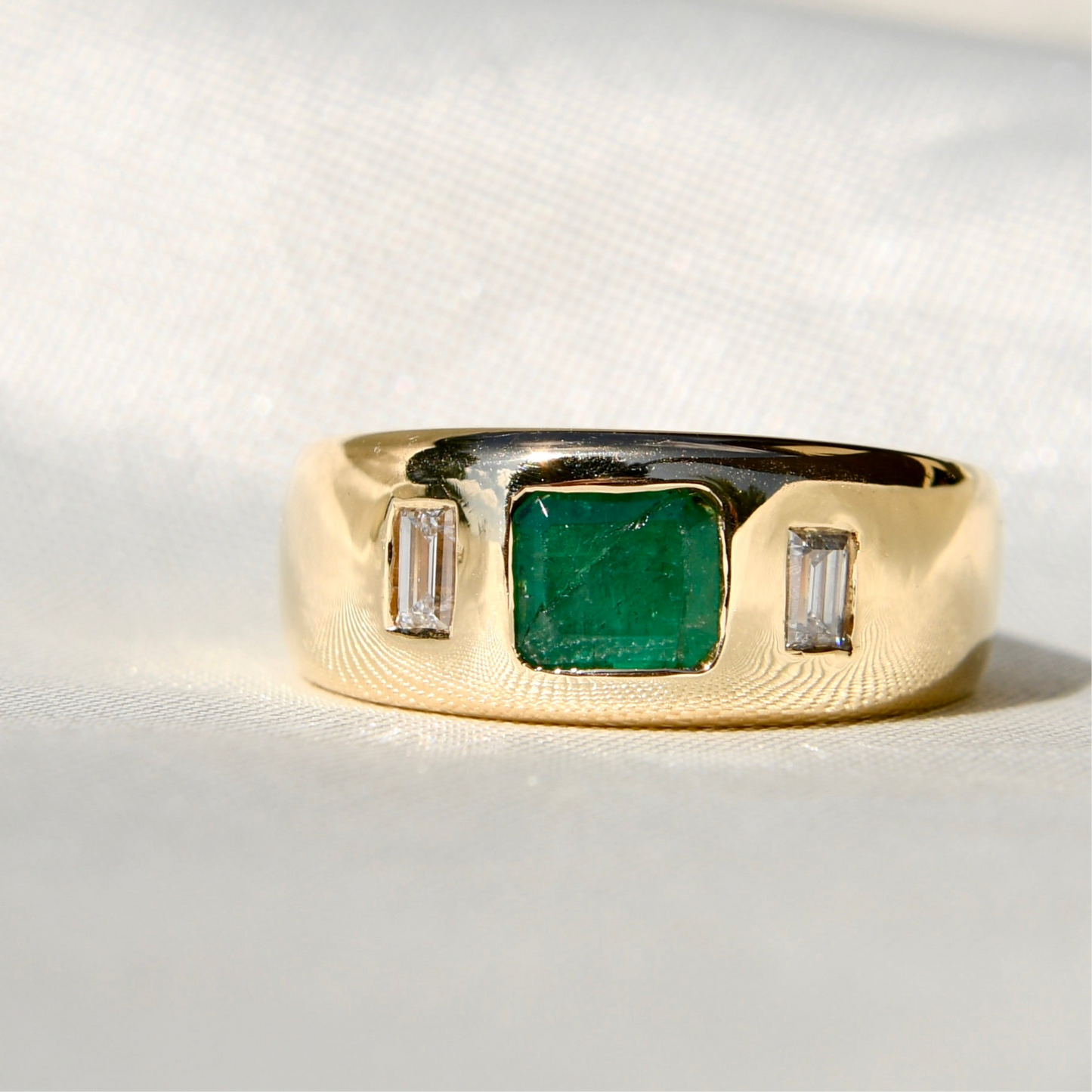 Vintage emerald and baguette cut diamond band ring