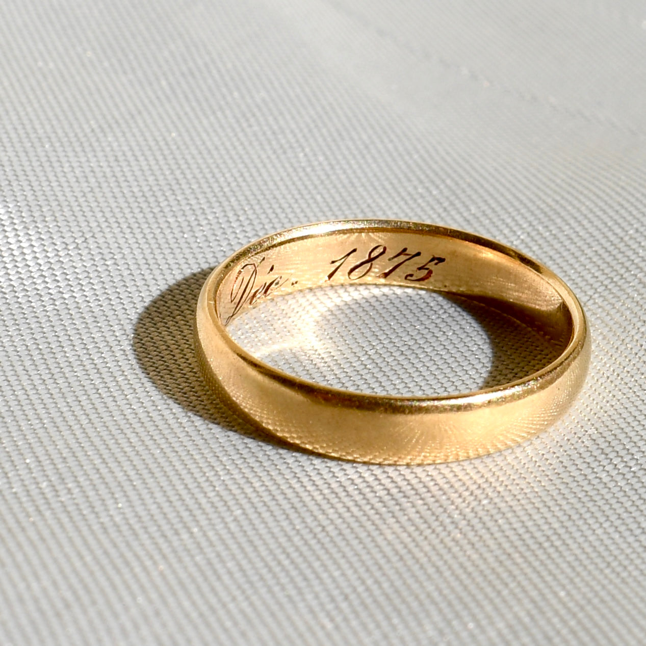 Antique wedding band, inscribed December 7, 1875