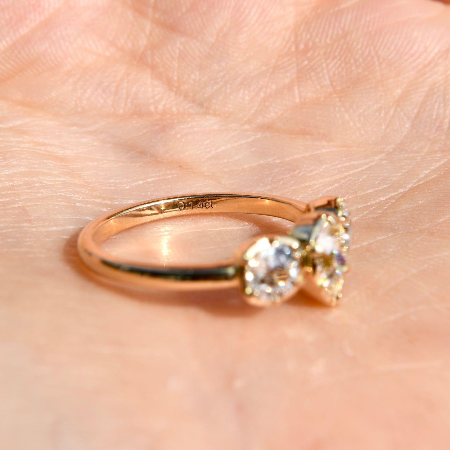 0.61 ct old pear and old mine cut diamond three stone ring