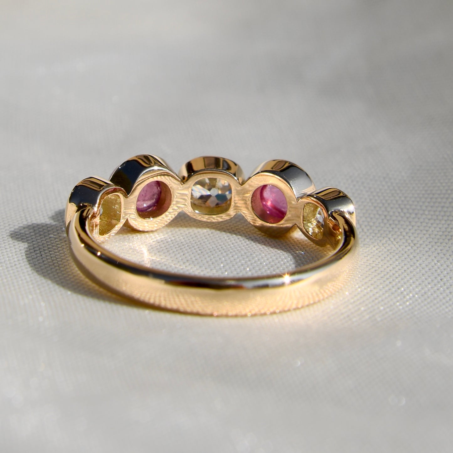 0.96 ct old mine cut diamond and tourmaline five stone ring