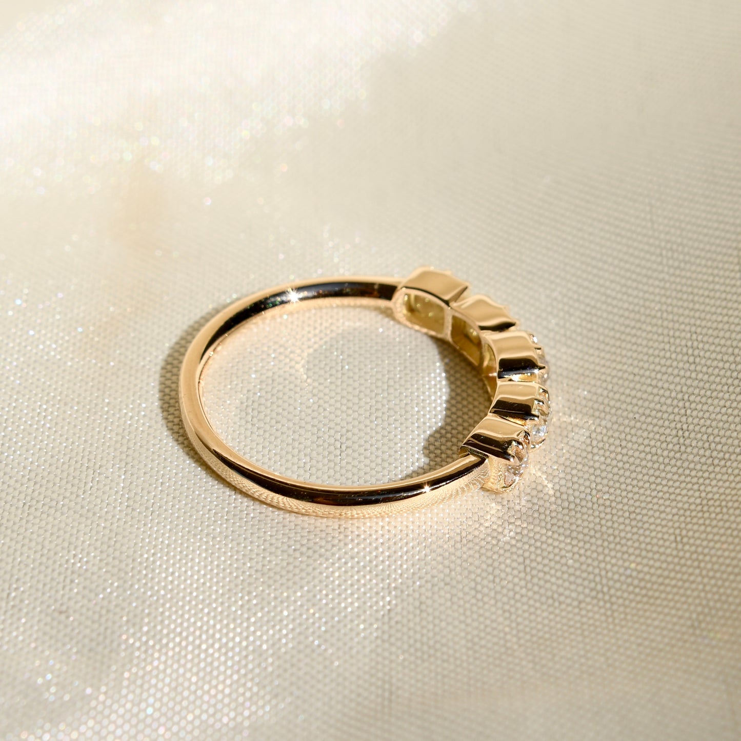 0.60 ct peruzzi cut diamond five stone band ring