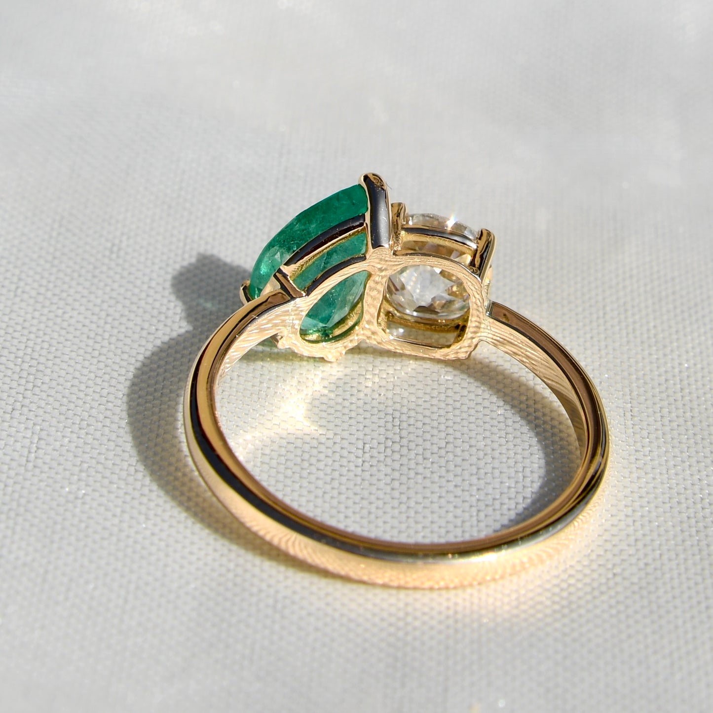 Colombian emerald and 1.10 ct old mine cut diamond Toi et Moi ring