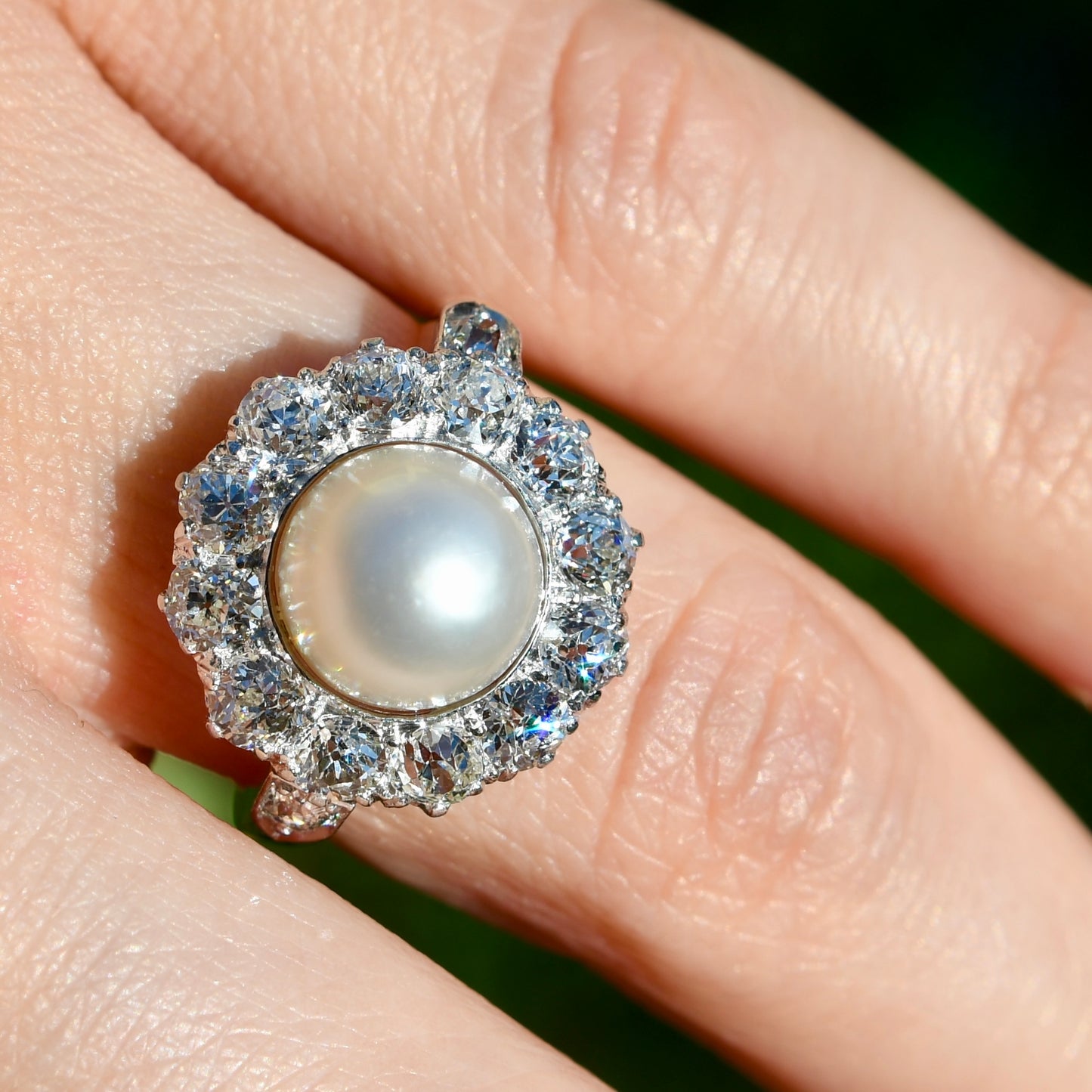Antique Belle Époque natural pearl and 1.74 ct old European cut diamond daisy ring