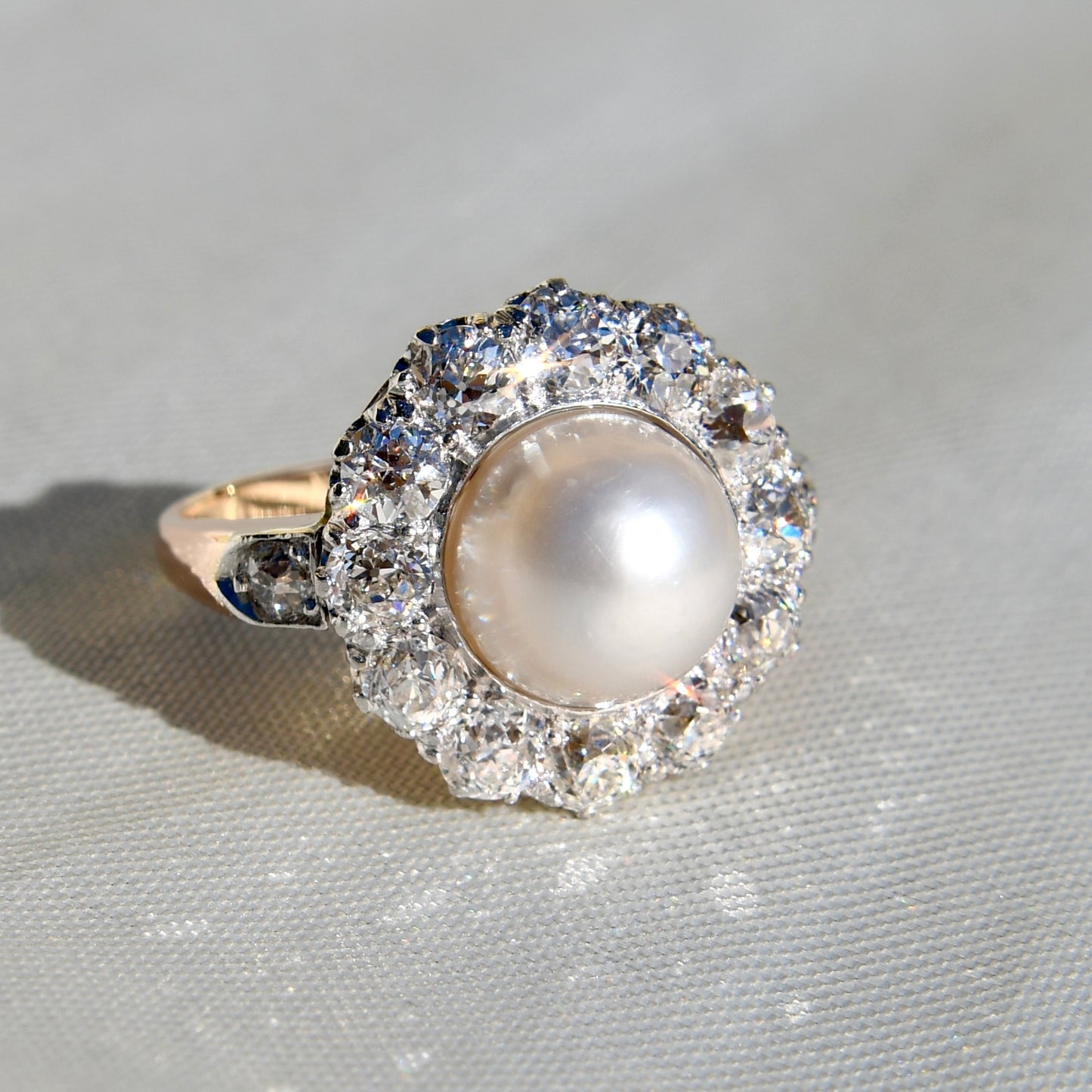 Antique Belle Époque natural pearl and 1.74 ct old European cut diamond daisy ring