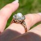 Antique natural pearl and 1.20 ct old mine cut diamond daisy ring