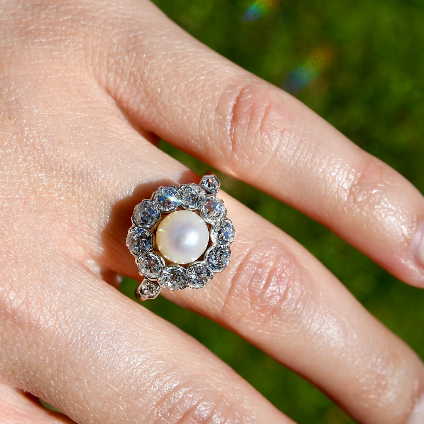 Antique Belle Époque natural pearl and 1.36 ct old European cut diamond daisy ring