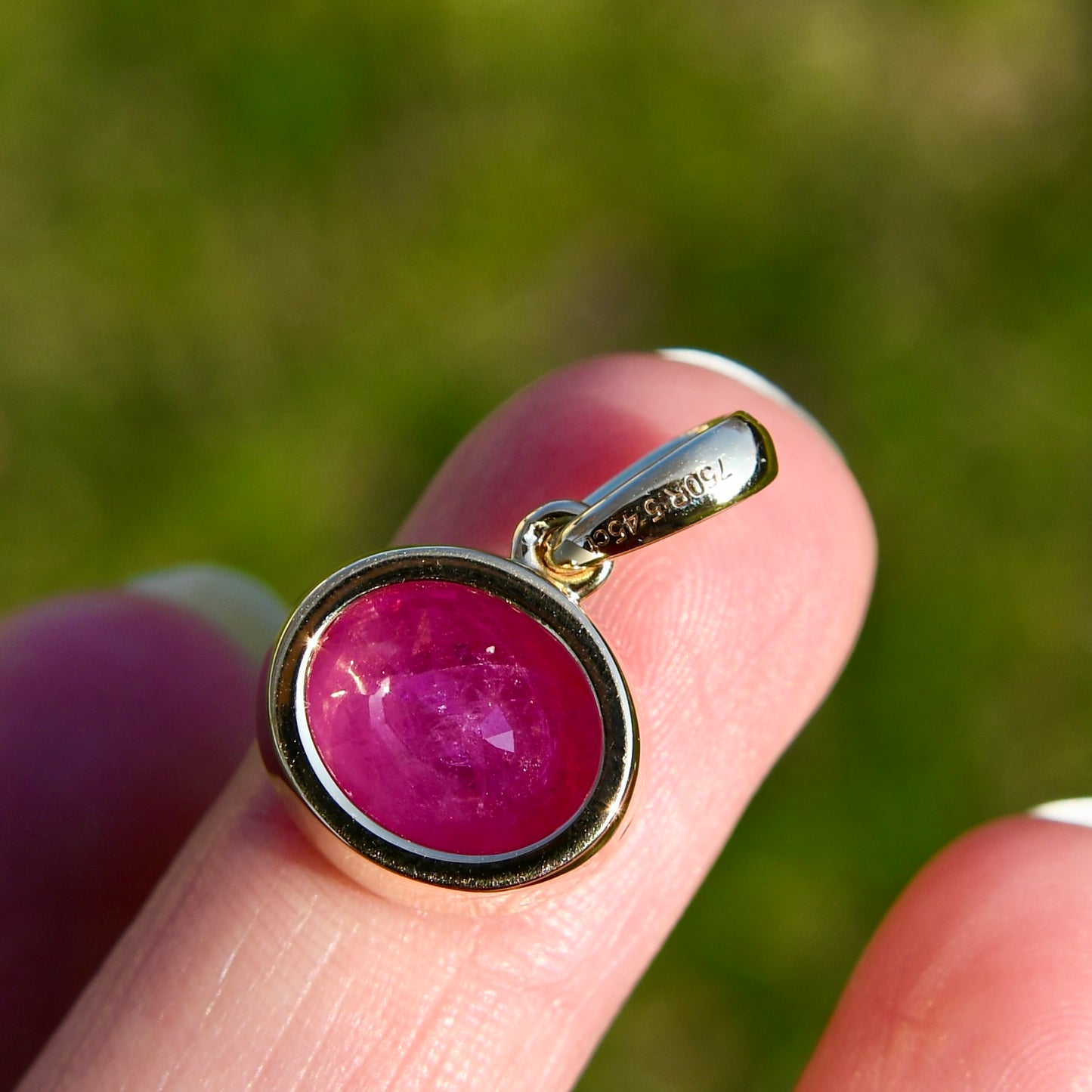 5.45 ct oval ruby pendant