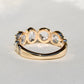 1.30 ct rose cut diamond four stone band ring