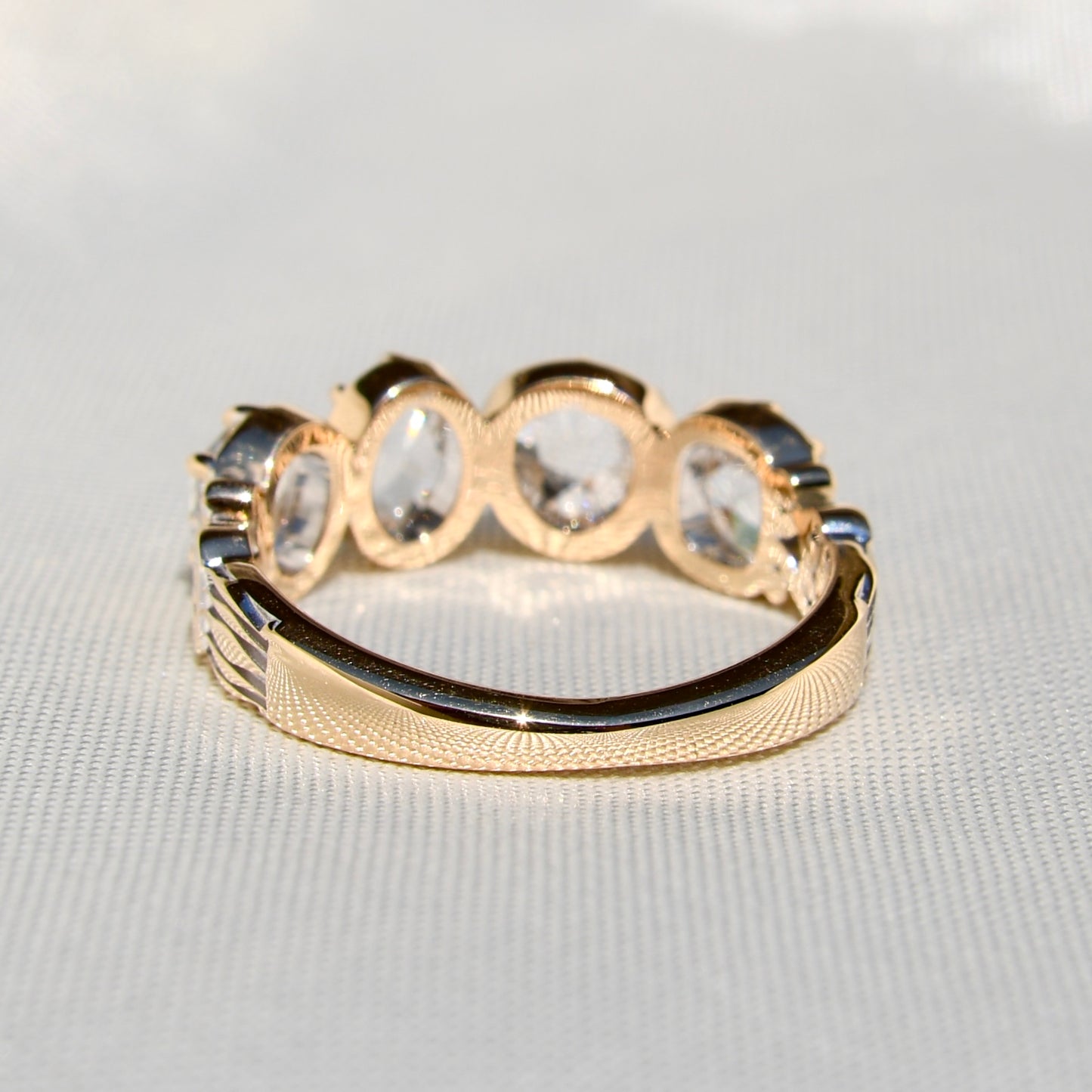 1.30 ct rose cut diamond four stone band ring