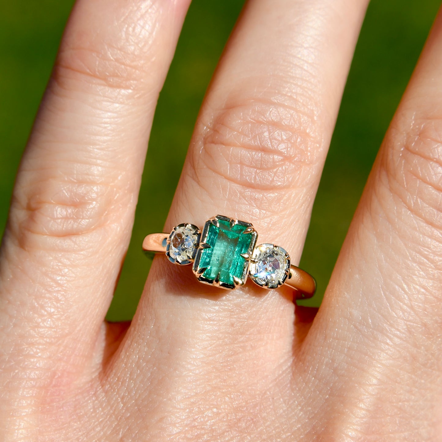 0.93 ct Colombian emerald and old mine cut diamond three stone ring