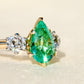 1.66 ct Colombian emerald and old mine cut diamond three stone ring
