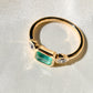 0.69 ct Colombian emerald and old pear cut diamond three stone ring