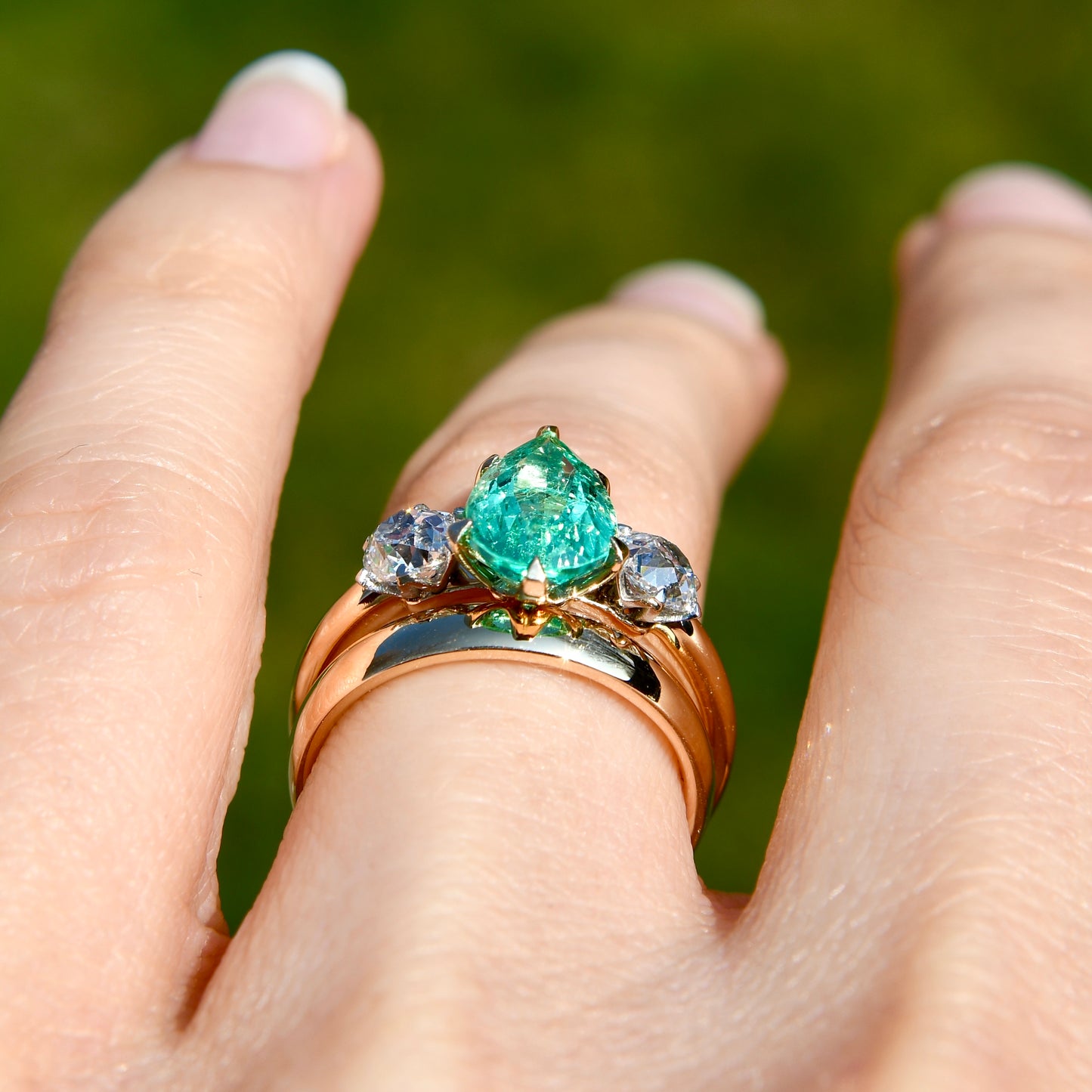 1.66 ct Colombian emerald and old mine cut diamond three stone ring