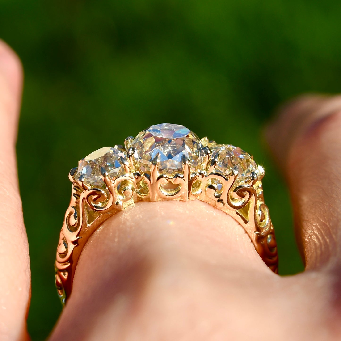 1.62 ct old mine and old European cut diamond three stone ring