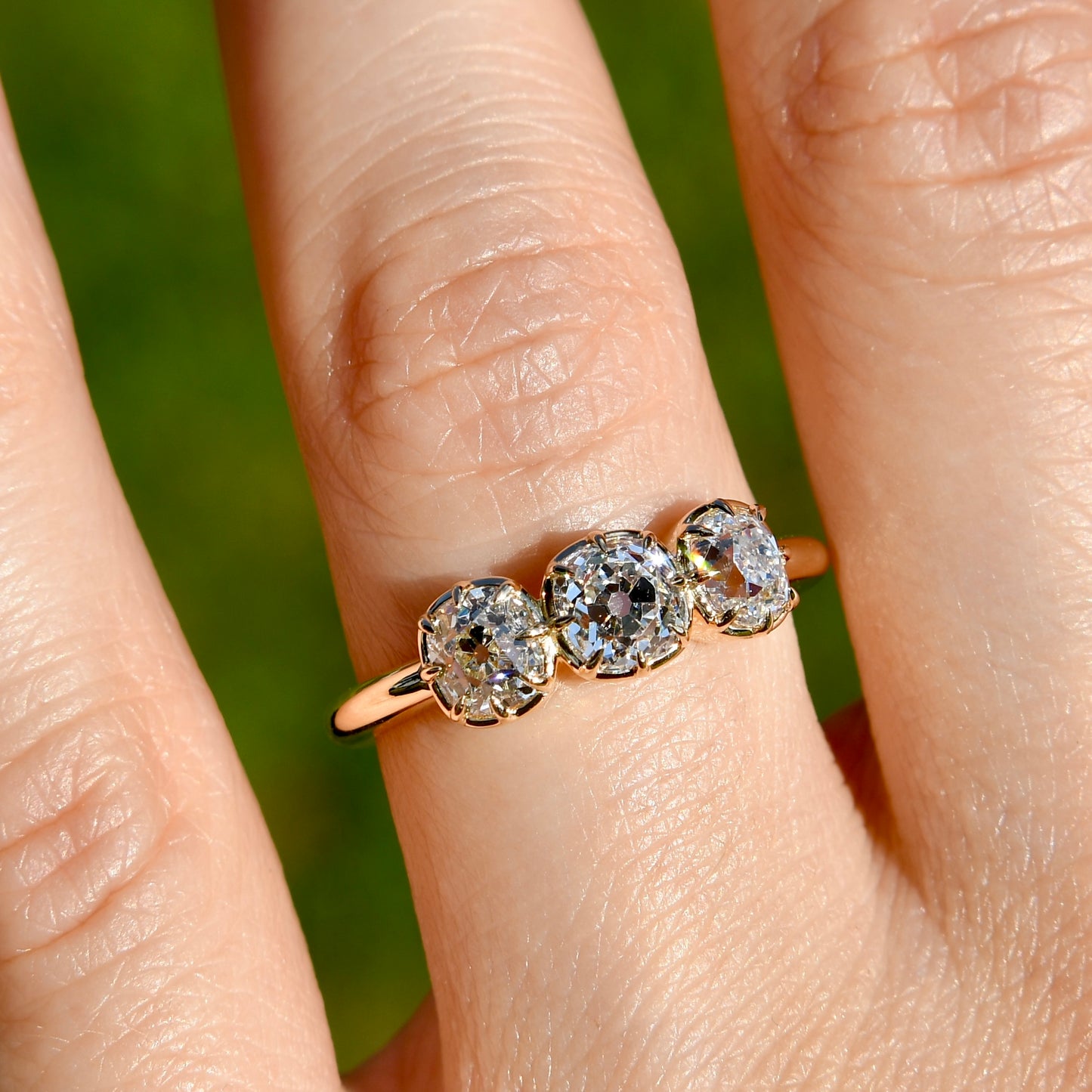 0.53 ct old mine cut diamond three stone ring