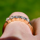 0.52 ct peruzzi cut diamond five stone band ring
