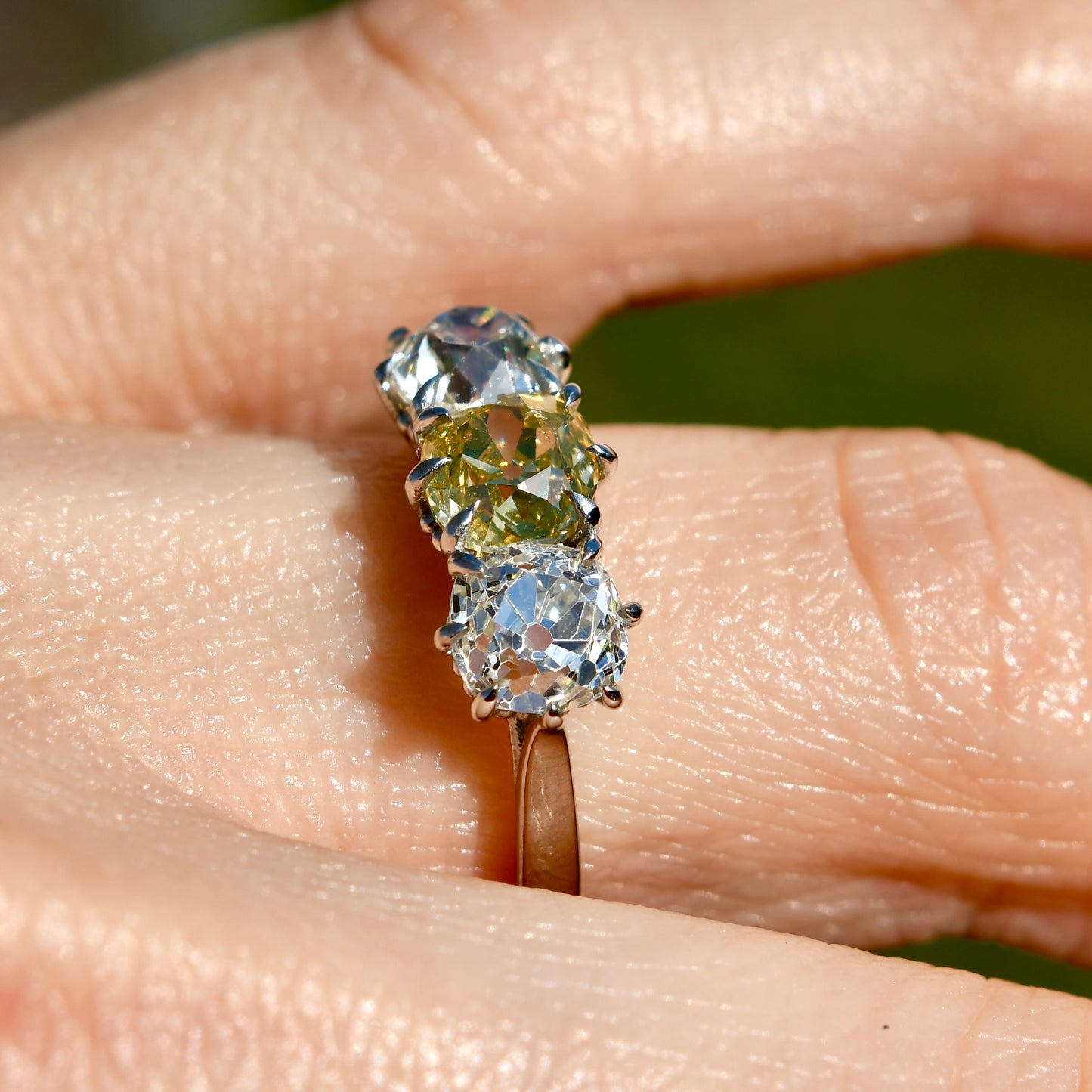 2.66 ct old mine cut diamond three stone ring