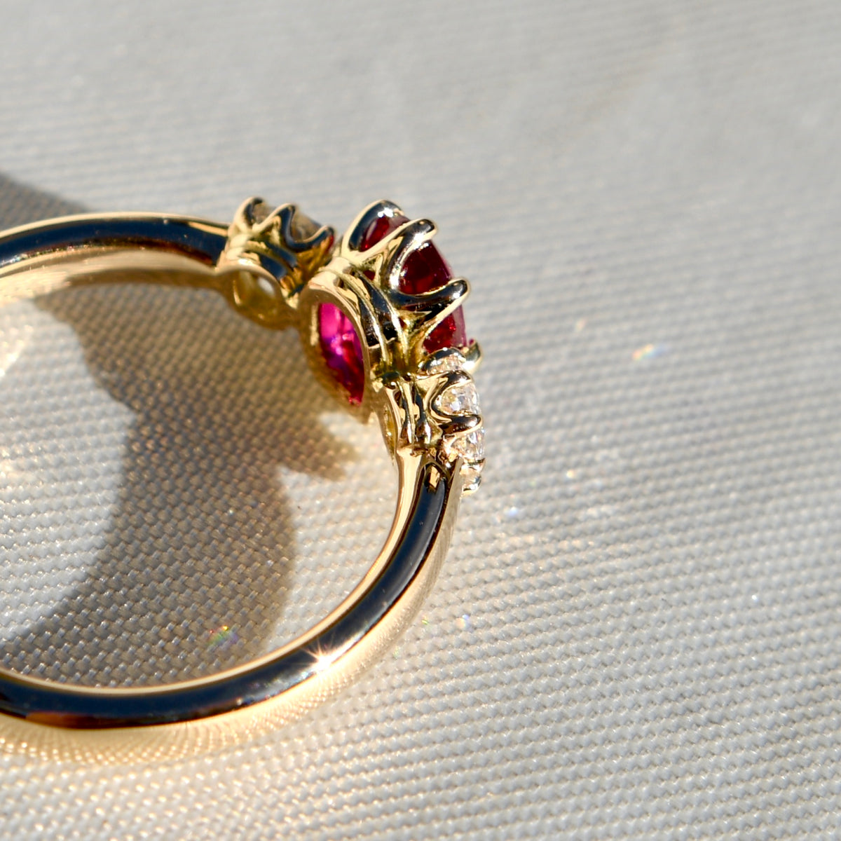 1.03 ct ruby and old mine cut diamond three stone ring