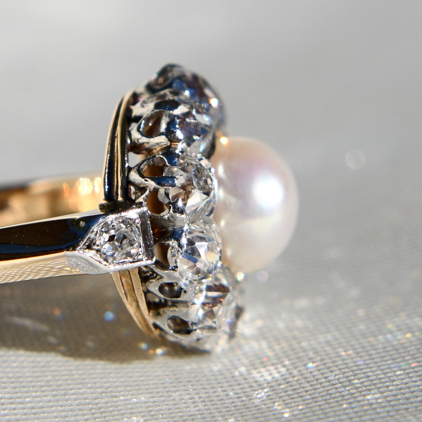 Antique Belle Époque natural pearl and 1.36 ct old European cut diamond daisy ring