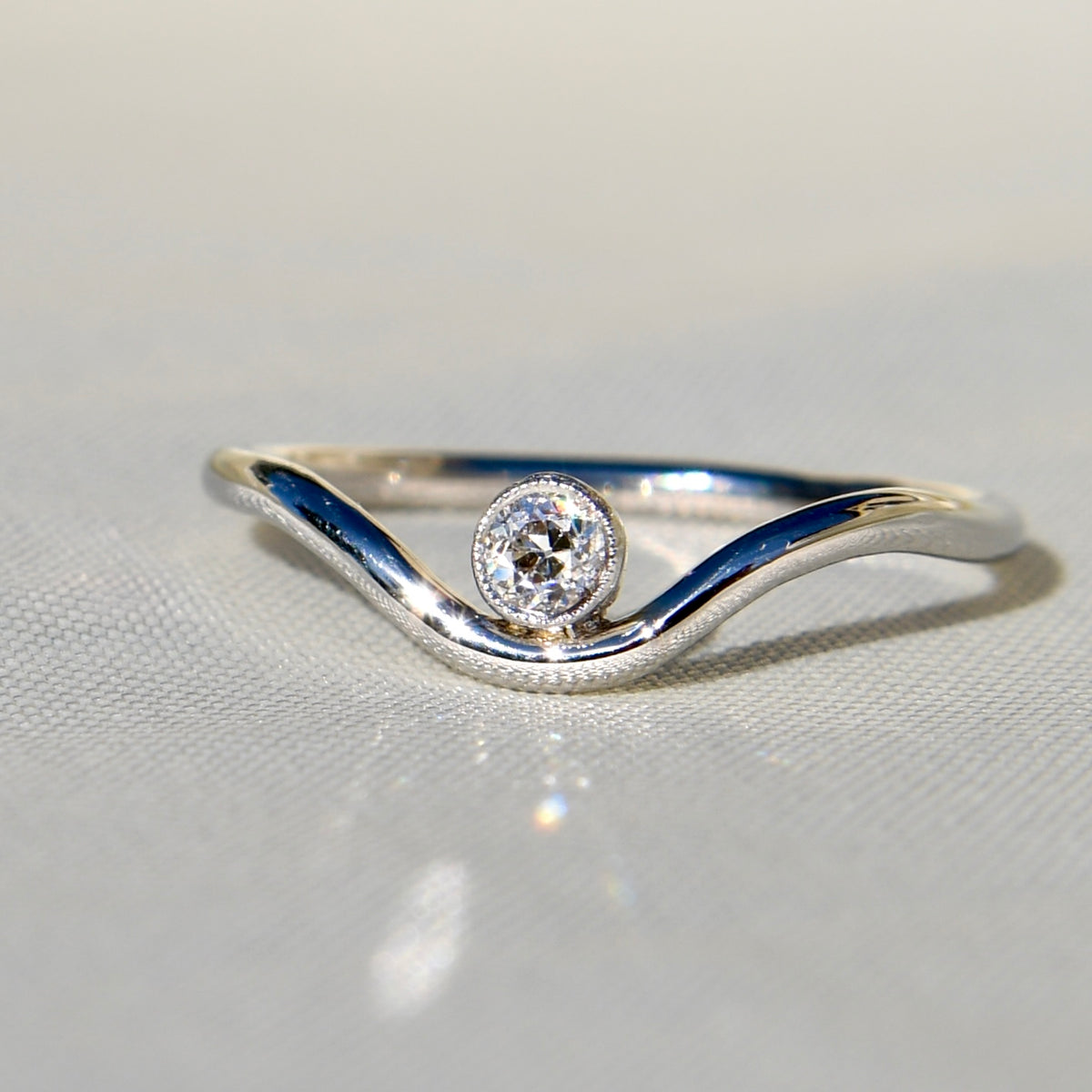 0.10 ct old European cut diamond wave ring