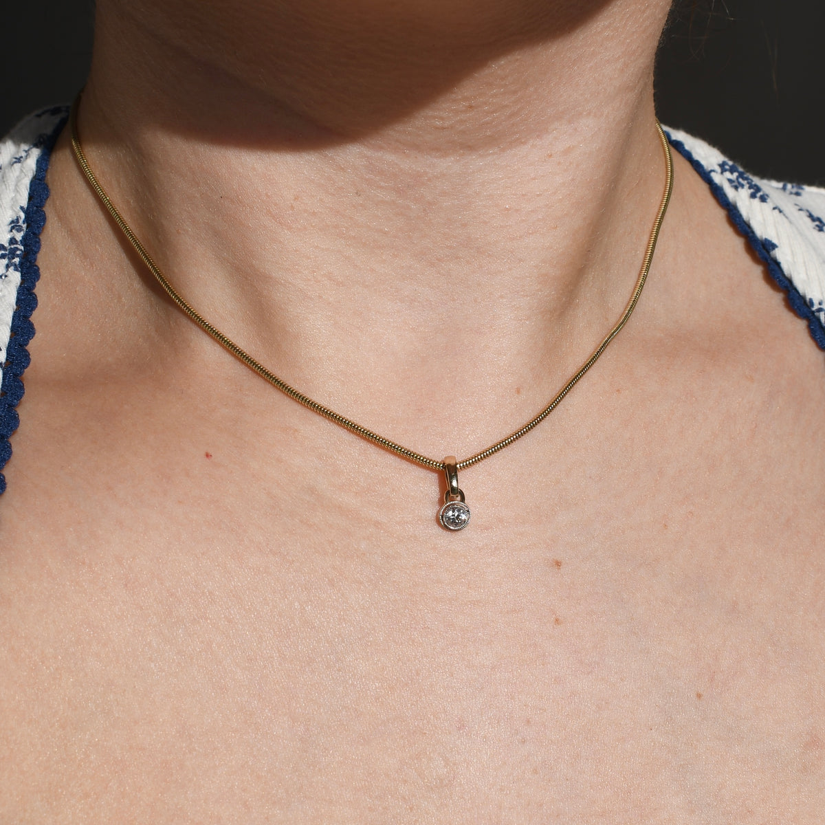 0.20 ct old European cut diamond pendant