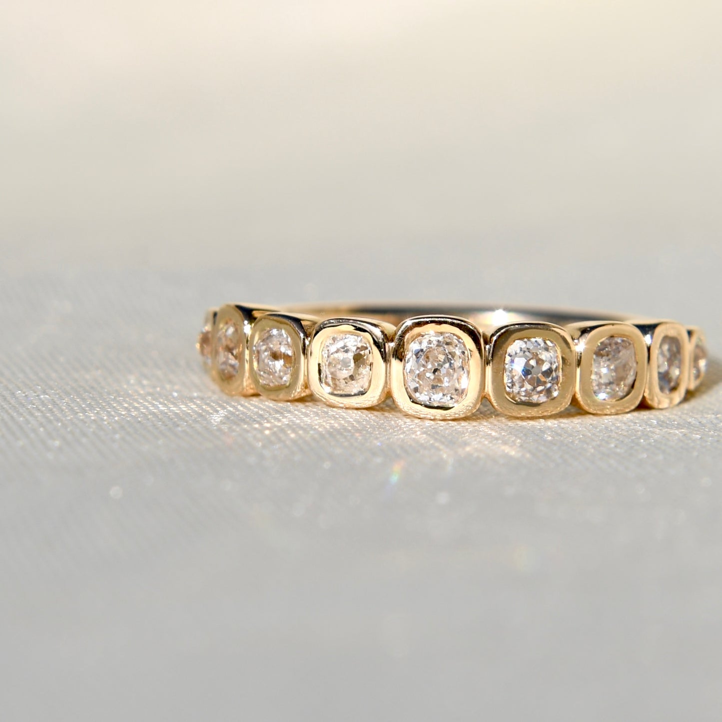 0.52 ct old mine cut diamond nine stone ring