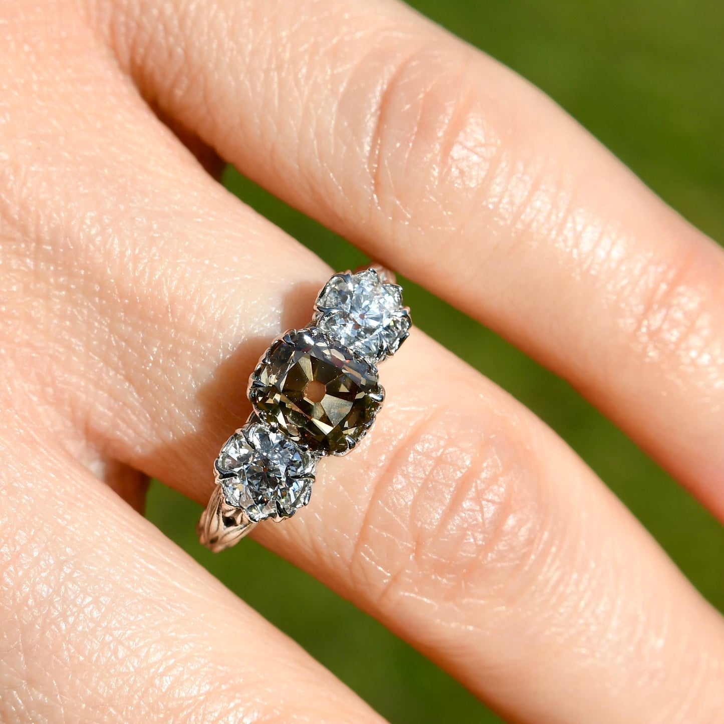 2.97 ct old mine and old European cut diamond tulip three stone ring