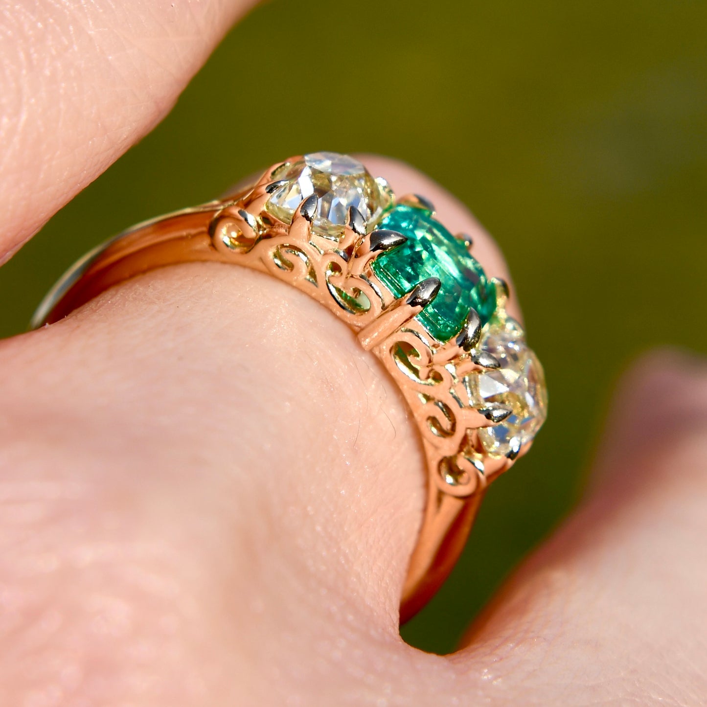 0.95 ct Colombian emerald and old mine cut diamond three stone ring