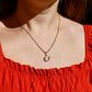 Antique 0.60 ct old European cut diamond horseshoe pendant