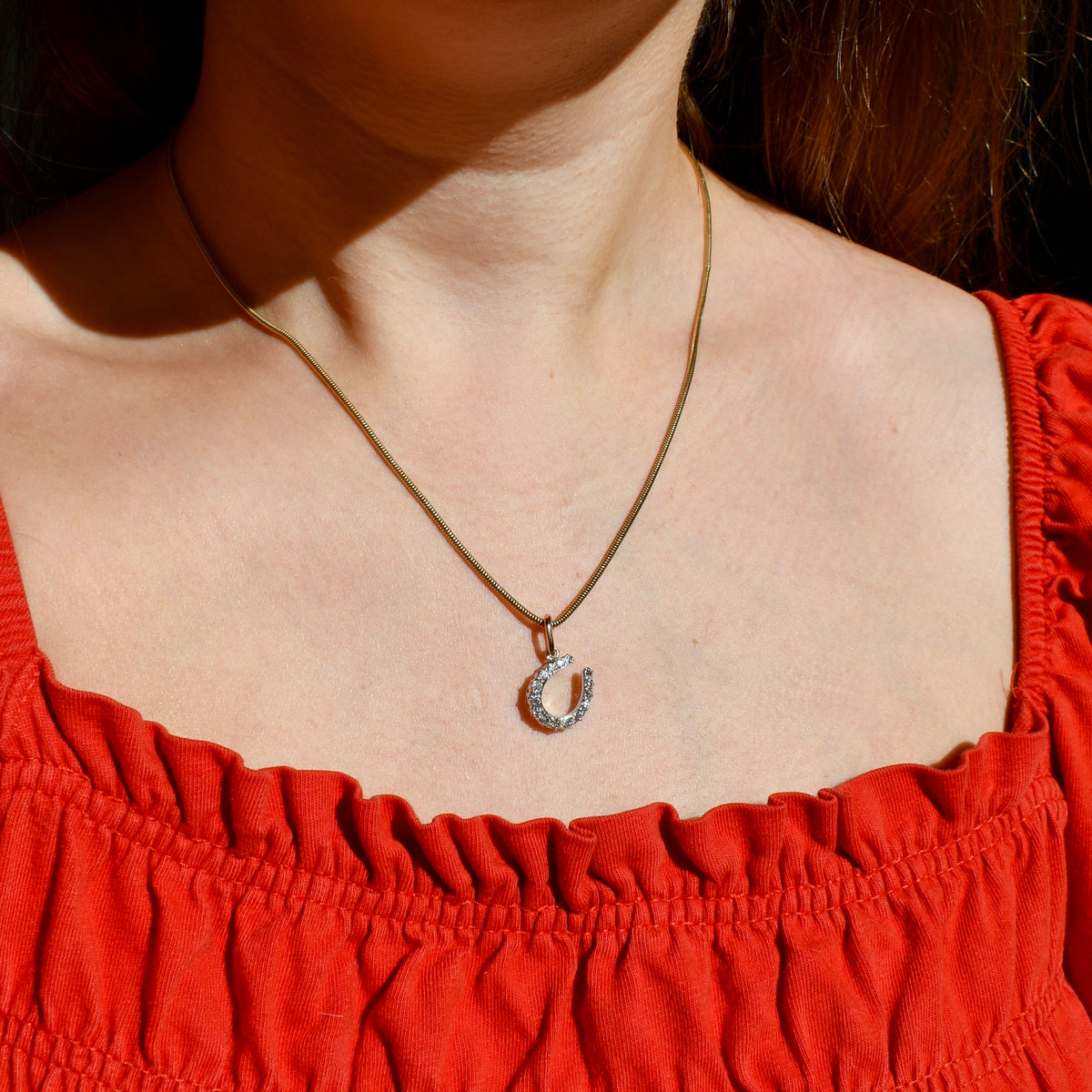 Antique 0.60 ct old European cut diamond horseshoe pendant