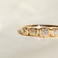 0.60 ct peruzzi cut diamond five stone band ring