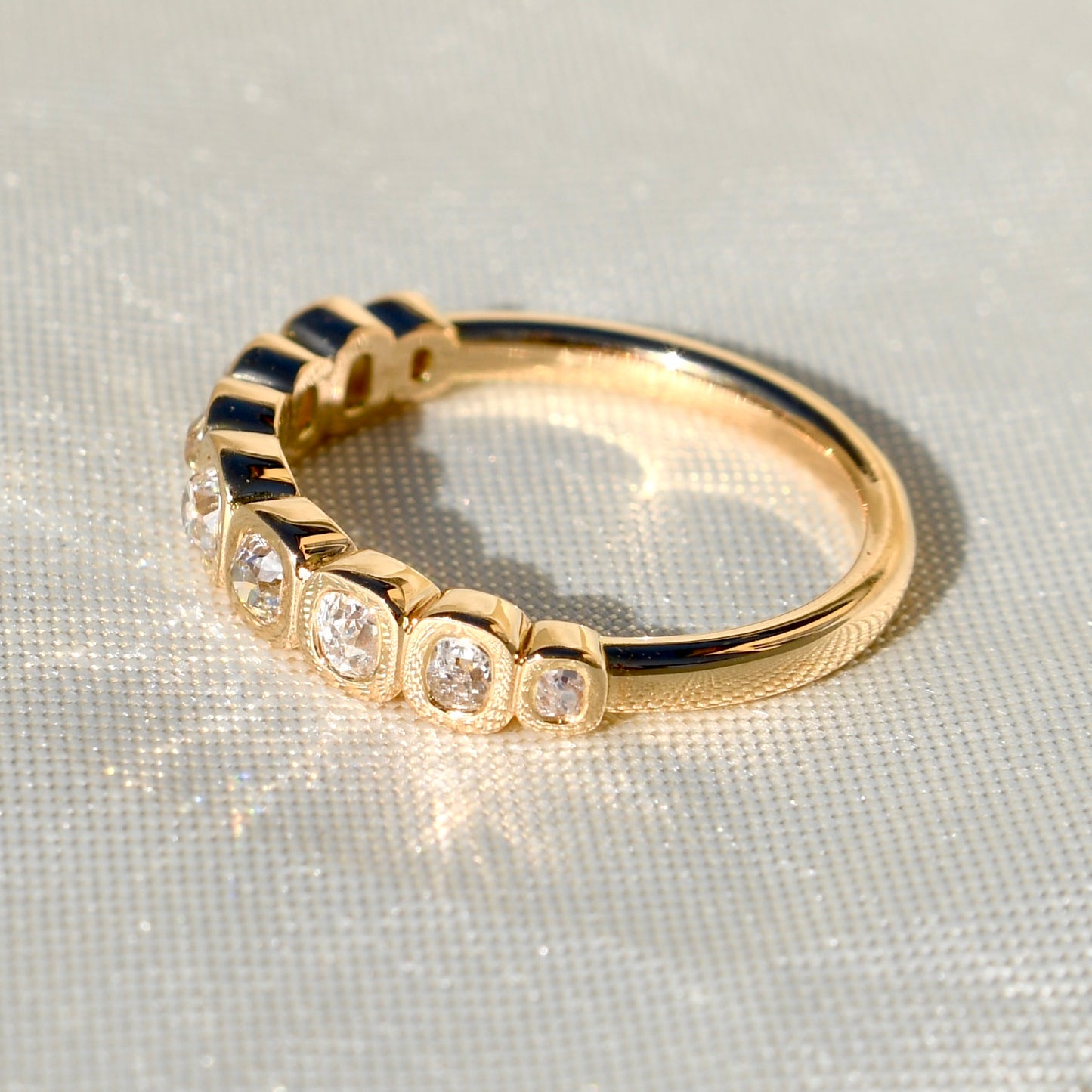 0.52 ct old mine cut diamond nine stone ring