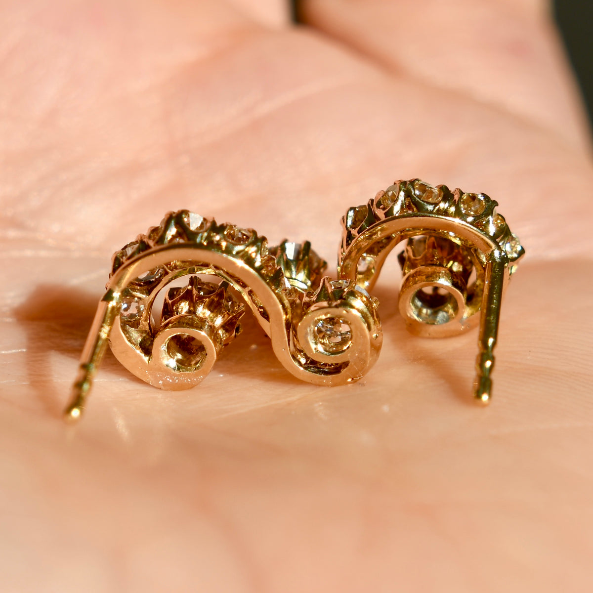 1.46 ct old mine cut diamond swirl stud earrings