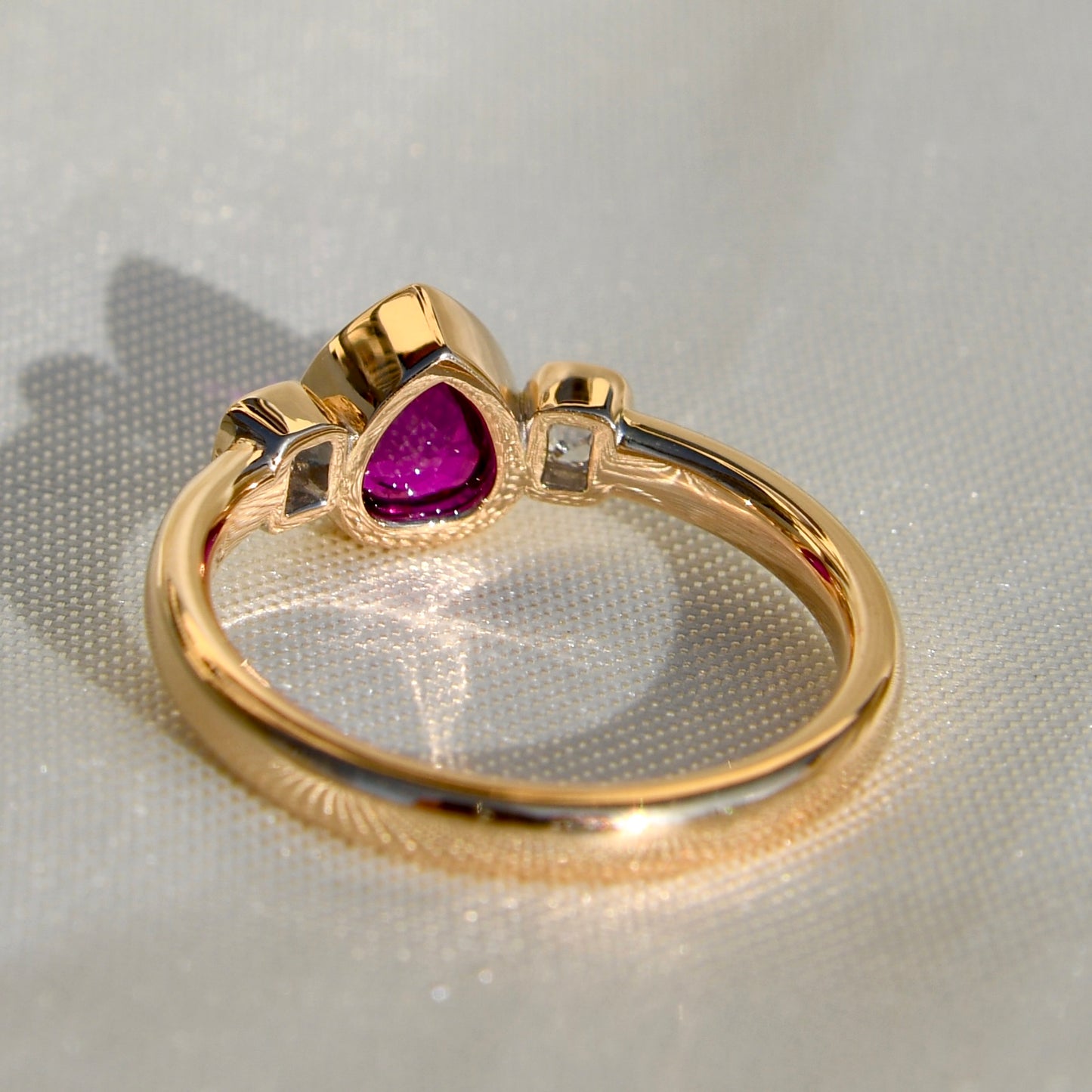 1.01 ct ruby and peruzzi cut diamond three stone ring