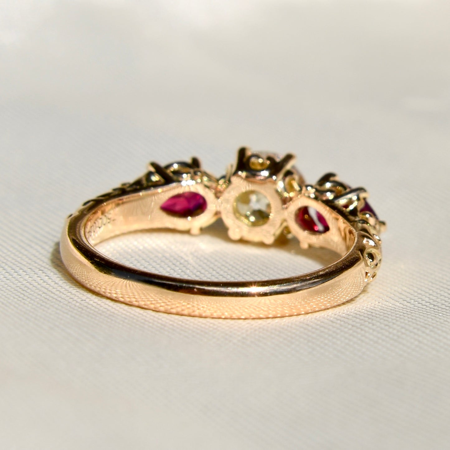 0.84 ct old European cut diamond and ruby three stone ring