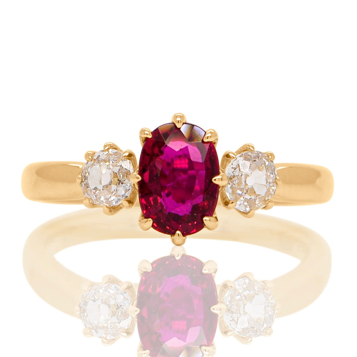 1.03 ct ruby and old mine cut diamond three stone ring