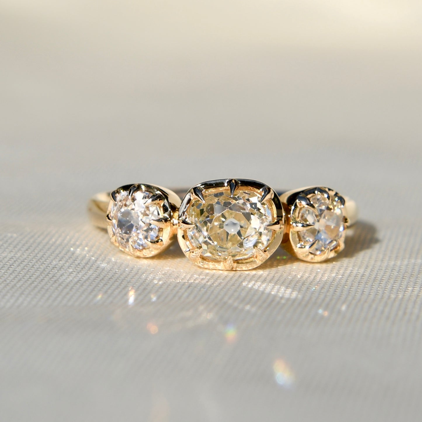 0.86 ct old mine cut diamond three stone ring