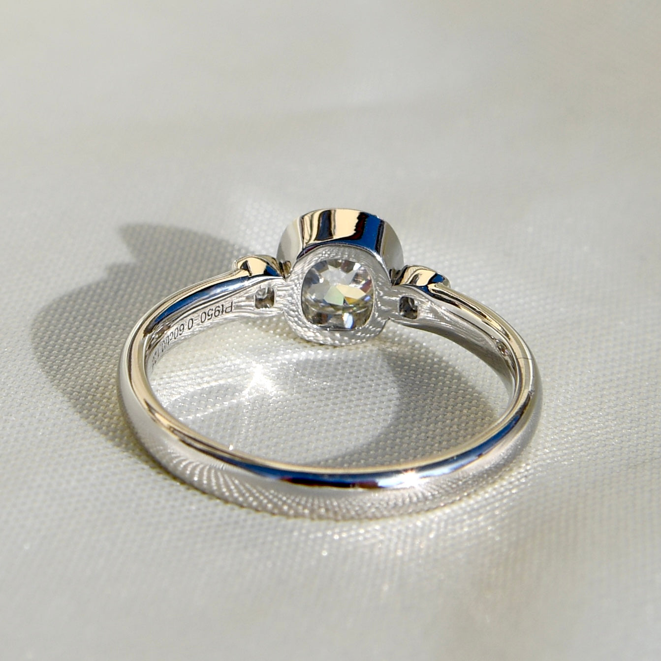 0.60 ct old mine and peruzzi cut diamond three stone ring