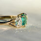 0.95 ct Colombian emerald and old mine cut diamond three stone ring
