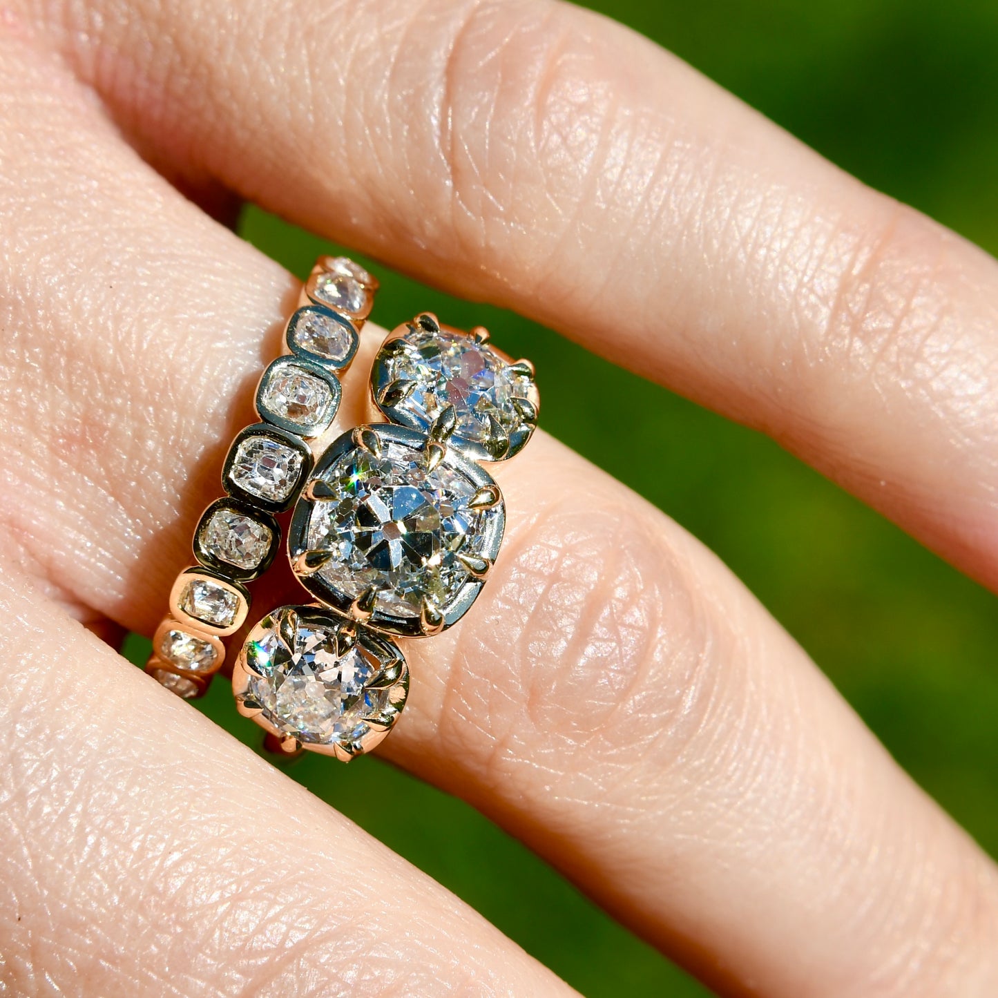 3.35 ct old mine cut diamond three stone ring