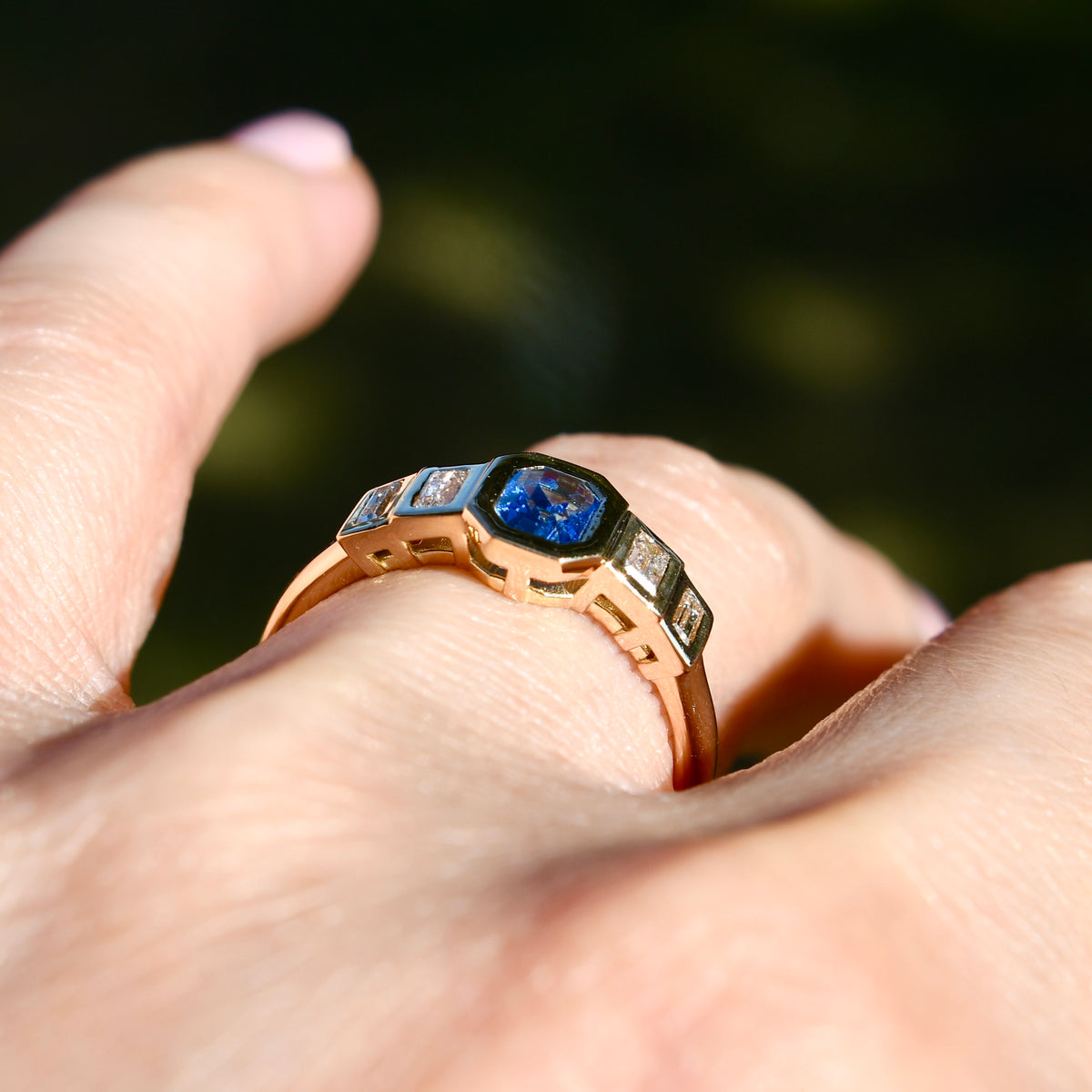 0.61 ct Ceylon sapphire and baguette cut diamond five stone ring