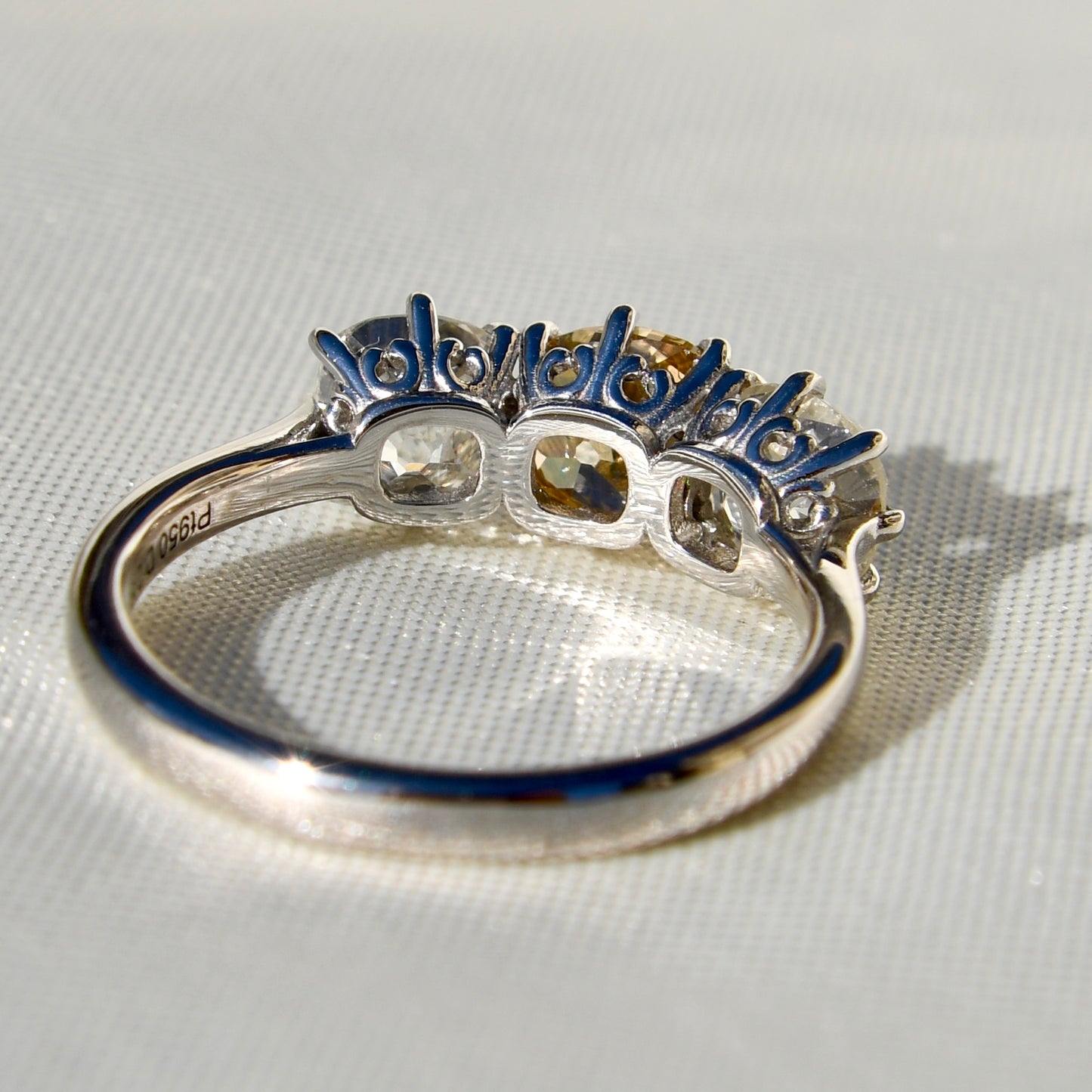 2.66 ct old mine cut diamond three stone ring