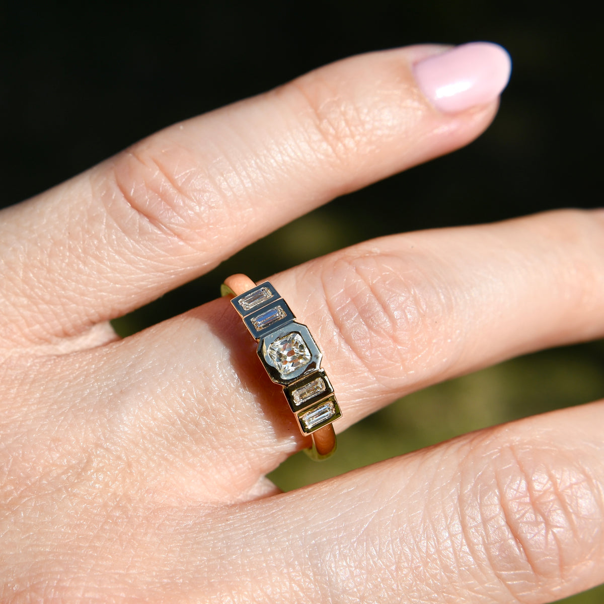 0.23 ct peruzzi and baguette cut diamond five stone ring