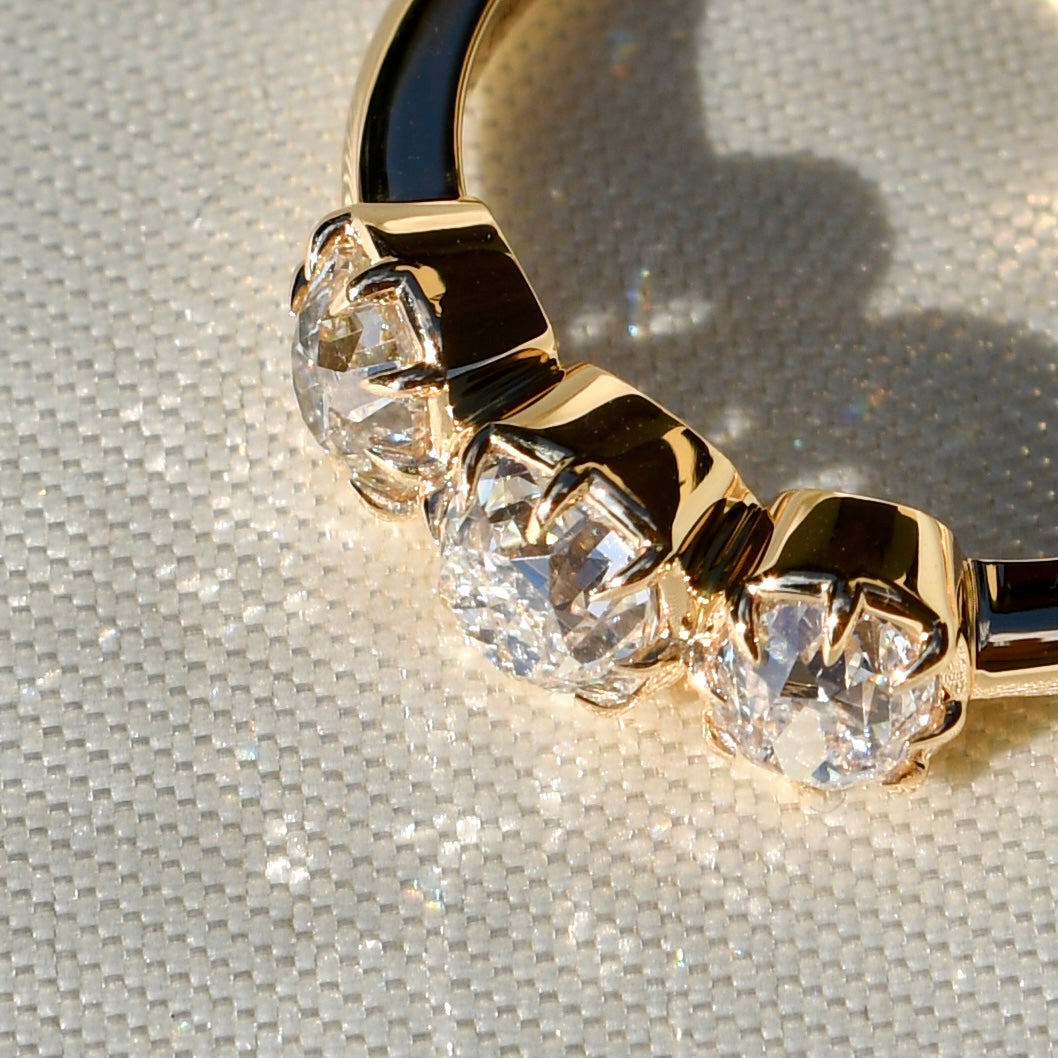 0.53 ct old mine cut diamond three stone ring
