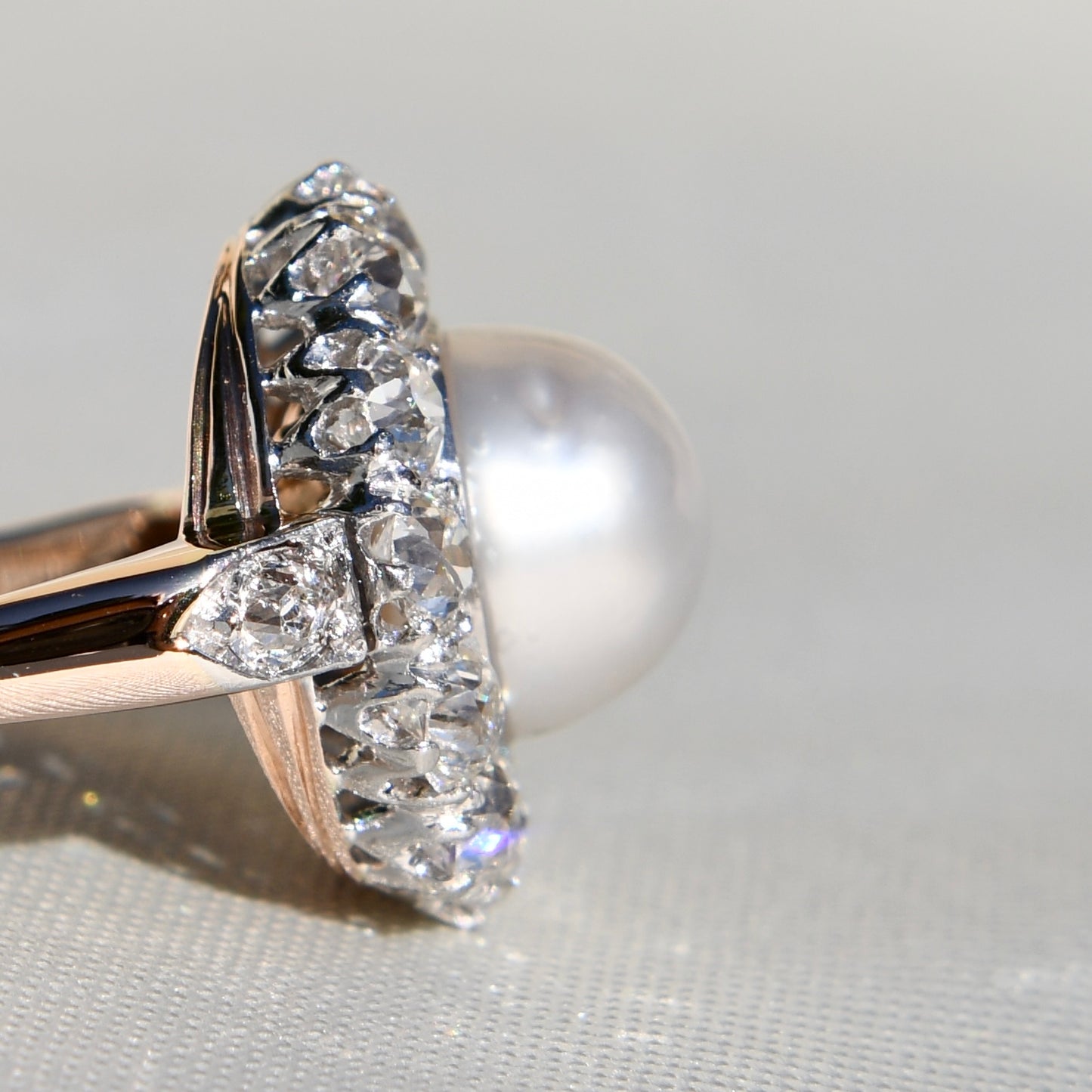 Antique Belle Époque natural pearl and 1.74 ct old European cut diamond daisy ring