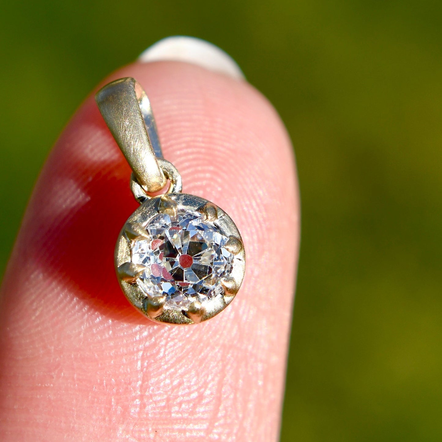 0.49 ct old mine cut diamond pendant